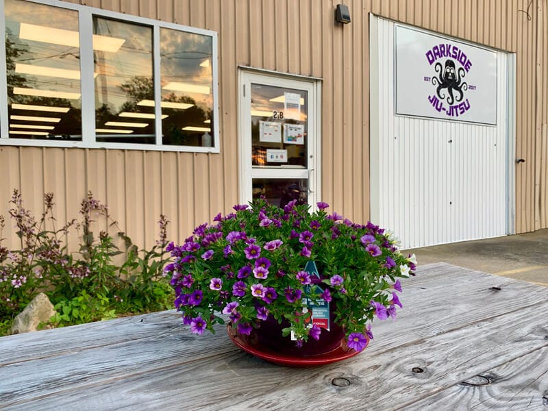 The Dark Side Jiu-Jitsu building exterior with its sign, at 1 George St in Plainville MA